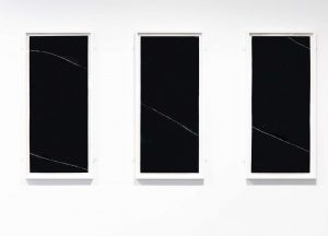 There are three black rectangles side by side on the screen.