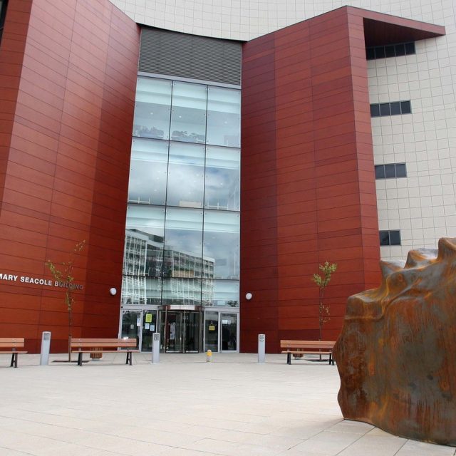 a sculpture representing a nurturing pose.