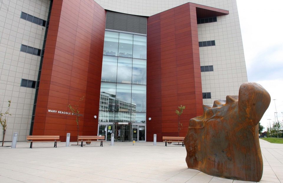 a sculpture representing a nurturing pose.