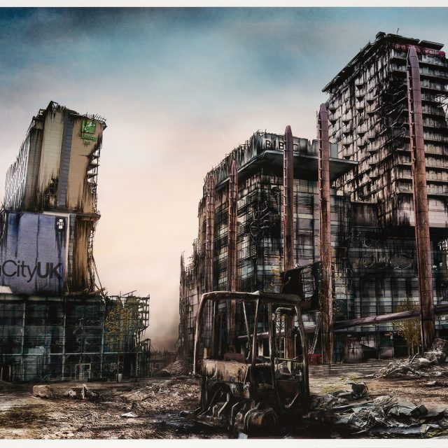A view of a desolate and destructed post-apocalyptic Media City with an abandoned forklift loader in the centre.