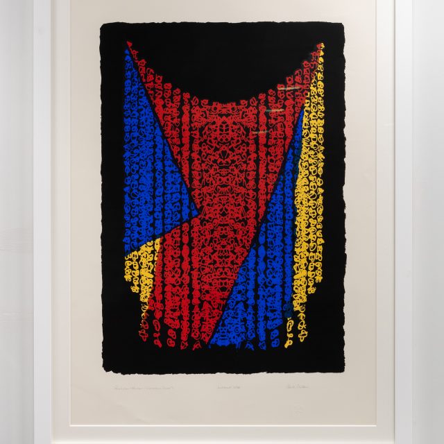 A colourful screenprint with a red, blue and yellow patern on a black background, in a white frame.